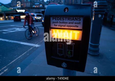 Pedestrian crossing push for green light box in Edinburgh, Scotland, UK Stock Photo
