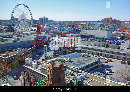 NIAGARA FALLS, CANADA -27 MAR 2019- View of Niagara Falls, Ontario, Canada, a city filled with amusement parks and tourist attractions by the Niagara  Stock Photo