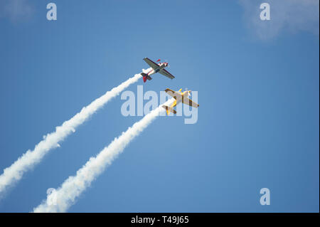 Four 4 Royal Moroccan Air Force aerobatic display team Marche Verte Green  March CAP-231 planes flying inverted with smoke wires Stock Photo - Alamy