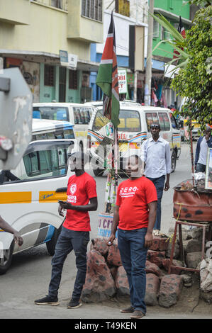 Nakuru, Rift Valley, Kenya. 14th Apr, 2019. Activists allied to Kenya's Red Vests Movement are seen walking on the street of Nakuru during the anti-corruption protest.Activists allied to Kenya's Red Vests Movement were protesting silently about increased levels of corruption in the government, the activists are demanding action to be taken against all government officials involved in corruption. Credit: ZUMA Press, Inc./Alamy Live News Stock Photo