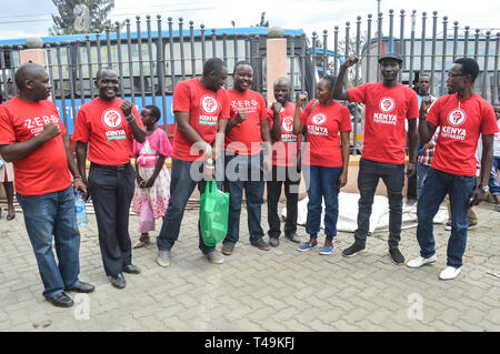 Nakuru, Rift Valley, Kenya. 14th Apr, 2019. A group of activists allied to Kenya's Red Vests Movement are seen posing for a photo after a church service.Activists allied to Kenya's Red Vests Movement were protesting silently about increased levels of corruption in the government, the activists are demanding action to be taken against all government officials involved in corruption. Credit: ZUMA Press, Inc./Alamy Live News Stock Photo
