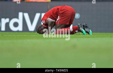 Liverpool. 15th Apr, 2019. Liverpool's Sadio Mane celebrates scoring during English Premier League match between Liverpool FC and Chelsea FC at Anfield in Liverpool, Britain on April 14, 2019. Liverpool won 2-0. Credit: Xinhua/Alamy Live News Stock Photo
