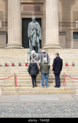 Liverpool, UK. 15th Apr, 2019. Mayor Joe Anderson and Lord Mayor Councillor Christine Banks lay a wreath at the memorial service at St George's Hall to mark the 30th anniversary of the Hillsborough disaster in which 96 Liverpool supporters lost their lives. Credit: ken biggs/Alamy Live News Stock Photo