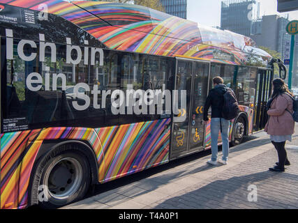 15 April 2019, Hessen, Frankfurt/Main: An electric bus drives through the city centre in test operation. The trial operation lasts four days and runs on two routes. Photo: Boris Roessler/dpa Stock Photo