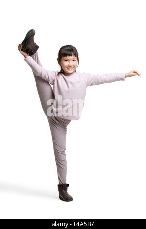 Pretty smiling woman doing the splits Stock Photo - Alamy