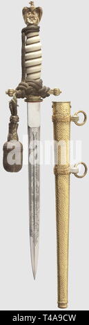 A model 1938 dagger for naval officers, with portepee, Maker Alcoso, Solingen Nickeled blade with etched fouled anchor and sailing ships amid tendrils, maker's mark on the ricasso. Pommel and crossguard with mostly intact gilding (somewhat tarnished). White plastic grip. With push-button scabbard release. Gilt scabbard showing a hammered pattern. Length 39 cm. Silver portepee with heavy wear (toned), historic, historical, 1930s, 20th century, navy, naval forces, military, militaria, branch of service, branches of service, armed forces, armed service, object, objects, stills, Editorial-Use-Only Stock Photo