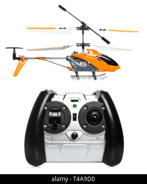 Remote controlled helicopter with controlling handset Stock Photo