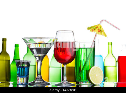 Different alcohol drinks and cocktails on bar Stock Photo