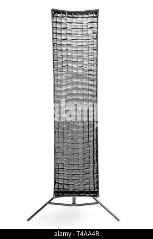 Rectangular soft box with honeycombs on a rack on a white background in the studio isolated Stock Photo
