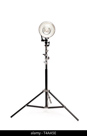 Powerful photo flash on the rack on a white background in the studio Stock Photo