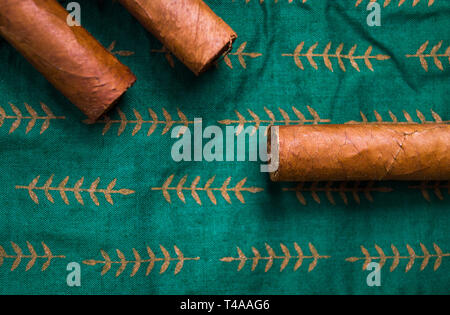 Bunch of Cuban cigars on a table Stock Photo