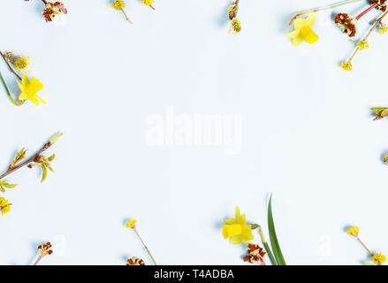 Festive flower composition on the white wooden background. Overhead view Stock Photo
