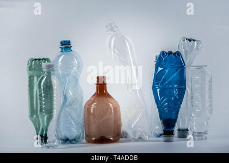 Crumples various water bottles standing in a row Stock Photo
