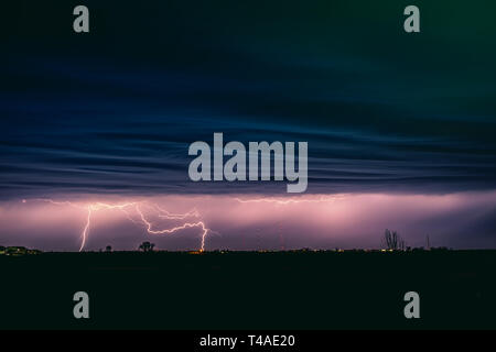 view of lightning strike over a - View Of Lightning Strike Over A Rural Farm Field Lightning Strikes The Ground Strong Thunder Dark Clouds In The Sky In The Midwest T4ae20