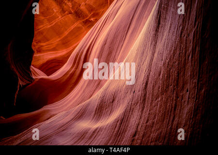 Red sandstone textures of Antelope Canyon, in the American Southwest located on Navajo land near Page, Arizona. Stock Photo