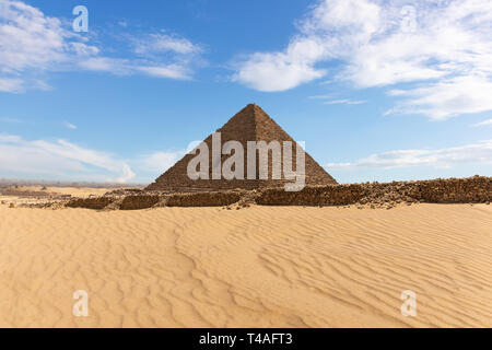 Beautiful view on the Pyramid of Menkaure in the desert of Giza Stock Photo