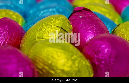Colourful collection of foil wrapped Easter Eggs Stock Photo