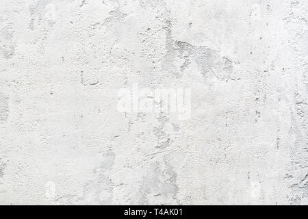 Patchy texture of rough concrete wall or abstract stucco pattern. Light gray background. Modern interior decor. Stock Photo