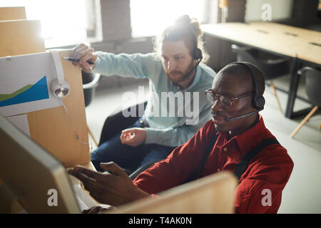 Office Workers in Cubicles Stock Photo