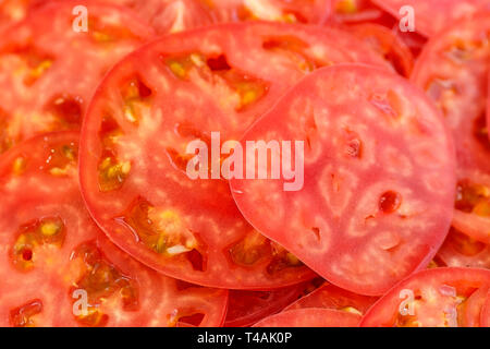 tomato sliced by circles Fresh healthy cutted vegetables Stock Photo