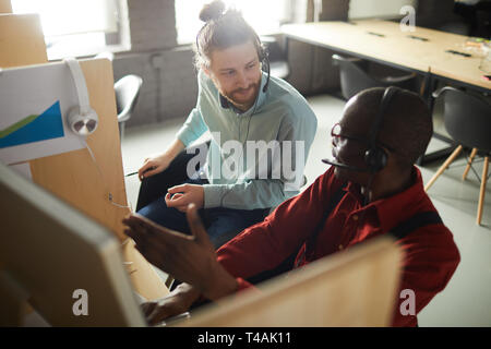 Two Office Workers in Cubicle Stock Photo