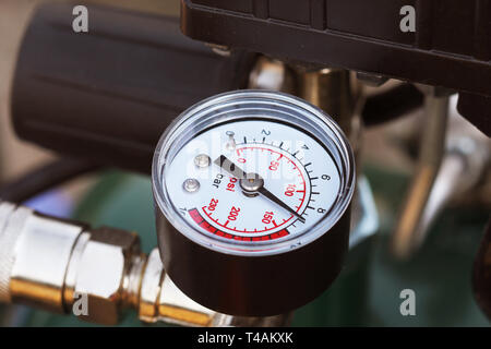 Mechanical pressure gauges. Traditional instruments for measuring pressure. Stock Photo