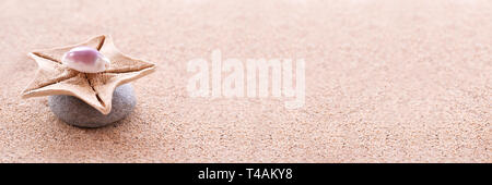 Zen stones, sand and seashells panoramic zen still life Stock Photo