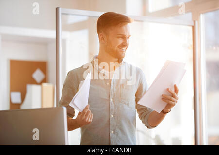 Contemporary Businessman in Sunlight Stock Photo