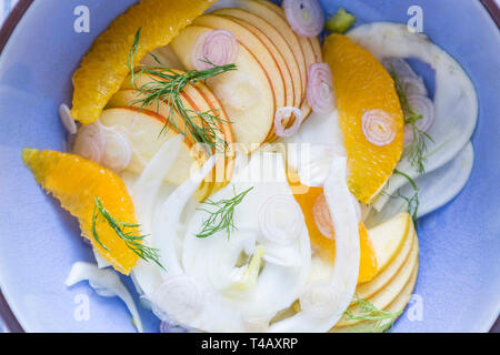 Fresh spring salad of fennel and orange with slices of apple. Stock Photo