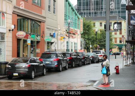 PITTSBURGH, USA - JUNE 30, 2013: People walk in Central Business District of Pittsburgh. It is the 2nd largest city of Pennsylvania with population of Stock Photo