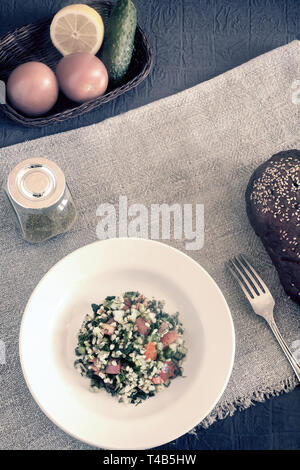 Salad Tabule - a common dish of Arabic cuisine. Stock Photo