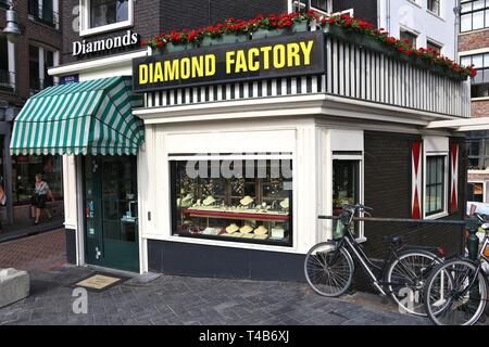 AMSTERDAM, NETHERLANDS - JULY 7, 2017: Diamond factory jewelry shop in Amsterdam, Netherlands. Amsterdam has a long history of diamond trade and indus Stock Photo