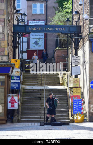 Scottish bagpiper below Market Brae Steps, Inverness, Highland, Scotland, United Kingdom Stock Photo