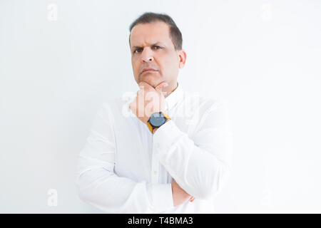 Middle age man thinking clueless about a question Stock Photo