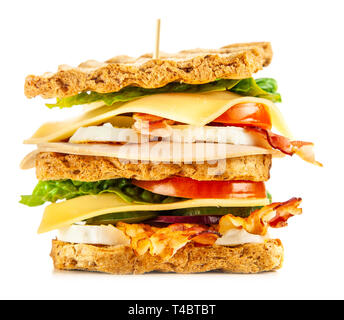 Tall club sandwich with eggs, turkey and bacon Stock Photo