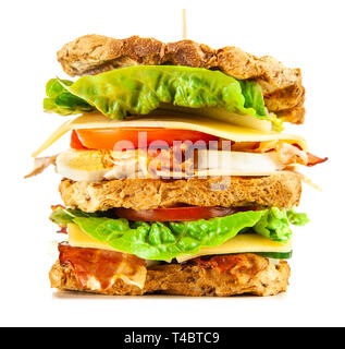Tall club sandwich with eggs, turkey and bacon Stock Photo