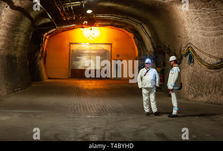 Gorleben, Germany. 15th Apr, 2019. Two miners stand underground in the former exploratory mine. After decades of dispute over a repository for highly radioactive nuclear waste in Gorleben, the exploration area of the mine has been almost completely dismantled. During a symbolic final inspection of the salt dome it was now shown what the so-called open-keeping operation looks like. Credit: Philipp Schulze/dpa/Alamy Live News Stock Photo
