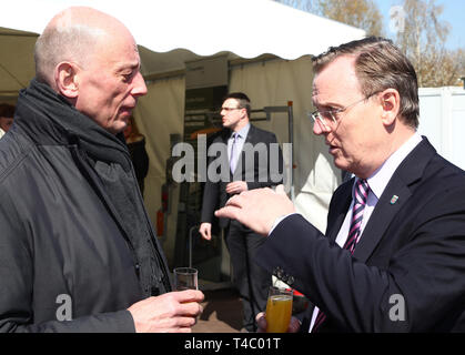 15 April 2019, Thuringia, Hermsdorf: Wolfgang Tiefensee (SPD), Thuringia's Economics Minister, and Bodo Ramelow (Die Linke), Thuringia's Prime Minister (l-r), speak together at the groundbreaking ceremony for a new center at the Fraunhofer Institute for Ceramic Technologies and Systems. For example, the Institute wants to continue working on new energy storage devices made of ceramics and plastics that last longer and are more powerful than today's batteries and accumulators. Photo: Bodo Schackow/dpa Stock Photo