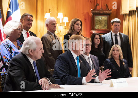 President Donald J. Trump, joined by Texas Lt. Governor Dan Patrick and supporters, talks with reporters about border security issues Wednesday, April 10, 2019, at a supportersÕ roundtable meeting in San Antonio, Texas  People:  President Donald Trump, Dan Patrick Stock Photo