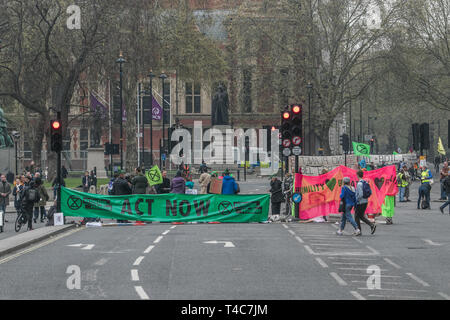 London, UK. 16th Apr, 2019. Environment activists belonging to Extinction Rebellion continue to protest blocking entrances into Parliament Square, Westminster and bringing parts of London to a standstill in order to raise awareness about the effects of global warming and CO2 emissions on the planet Credit: amer ghazzal/Alamy Live News