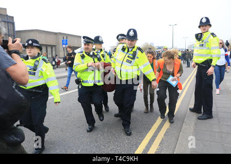 London, UK. 16th Apr, 2019. Police arrest people blocking Waterloo Bridge under the public order act for they refusing to move to Marble Arch. and  are dragged away to cheers from protesters on  Day 2 - Protestors from Extinction Rebellion have blocked several  junctions at (Hyde Park, Oxford Ciurcus, Waterloo Bridge and Parliament Square)  in London as part of their ongoing protest to demand action by the UK Government on global warming and the climate crisis'.  Credit: amer ghazzal/Alamy Live News Stock Photo