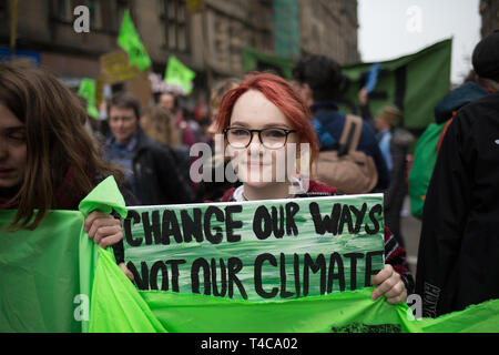 Edinburgh, Scotland, 16th April 2019. Extinction Rebellion (Scotland) climate protestors shut North Bridge to traffic during an 'International Day of Rebellion', asking for the government to declare a climate emergency, in Edinburgh, Scotland, on 16 April 2019. Credit: Jeremy Sutton-Hibbert/Alamy Live News Stock Photo