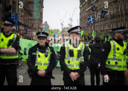 Edinburgh, Scotland, 16th April 2019. Extinction Rebellion (Scotland) climate protestors shut North Bridge to traffic during an 'International Day of Rebellion', asking for the government to declare a climate emergency, in Edinburgh, Scotland, on 16 April 2019. Credit: Jeremy Sutton-Hibbert/Alamy Live News Stock Photo