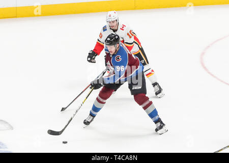 Denver, Colorado, USA. 15th Apr, 2019. Colorado Avalanche right wing Mikko Rantanen (96) skates with the puck as Calgary Flames center Derek Ryan (10) trails play during the Calgary Flames and Colorado Avalanche NHL playoff game at Pepsi Center in Denver, Colorado. Colorado defeated Calgary 6-2. John Crouch/CSM/Alamy Live News Stock Photo