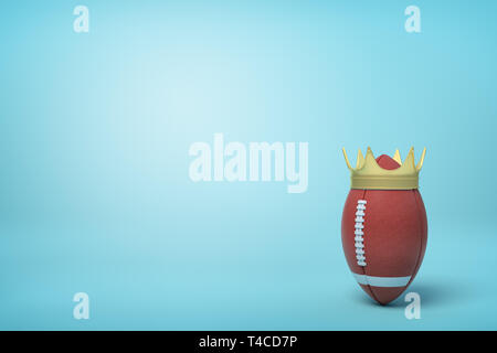 3d rendering of brown ball for American football standing upright and wearing golden crown on light blue background. Stock Photo