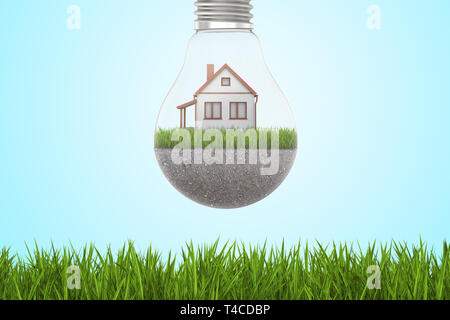 3d rendering of light bulb with house on green lawn and with gravel road inside, hanging above green grass on light blue background. Stock Photo