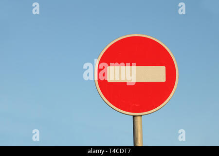 Road sign no entry on a blue background Stock Photo