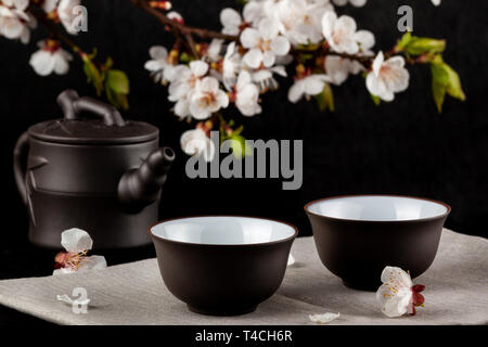 Chinese brown teapot and cups for tea Stock Photo