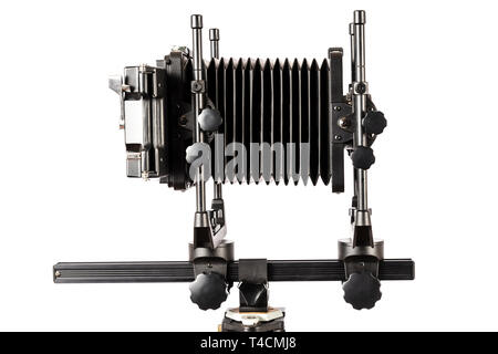 Horizontal shot of a view camera with bellows extended isolated on white with copy space. Stock Photo