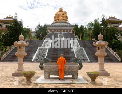 Happy Buddha, monk at an altar, Chiang Rai Province, Northern Thailand, Thailand Stock Photo
